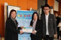 Dr. Isabel S.S. Hwang (middle) receives Poster Commendation for her poster and oral presentations